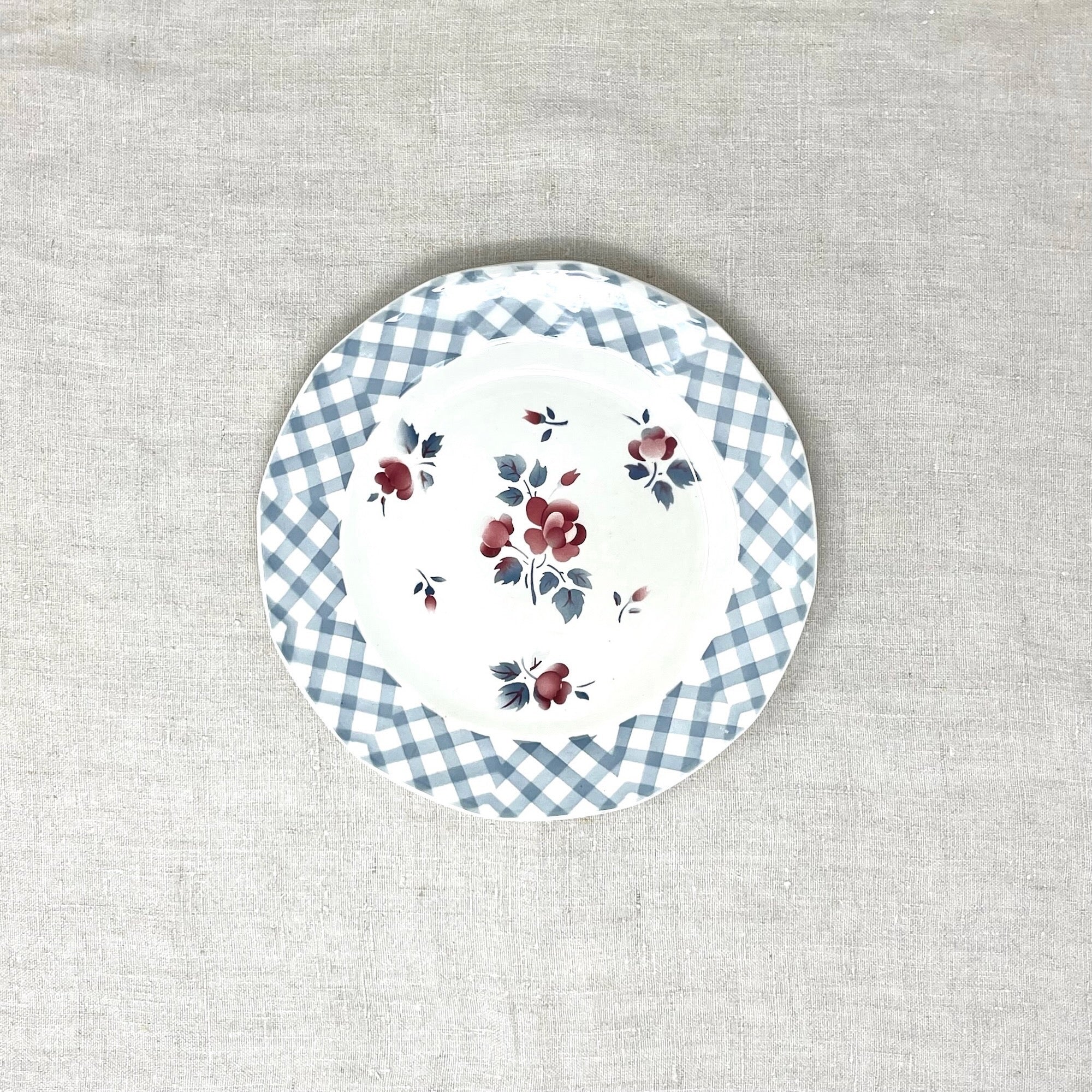 Blue checkered plate with roses